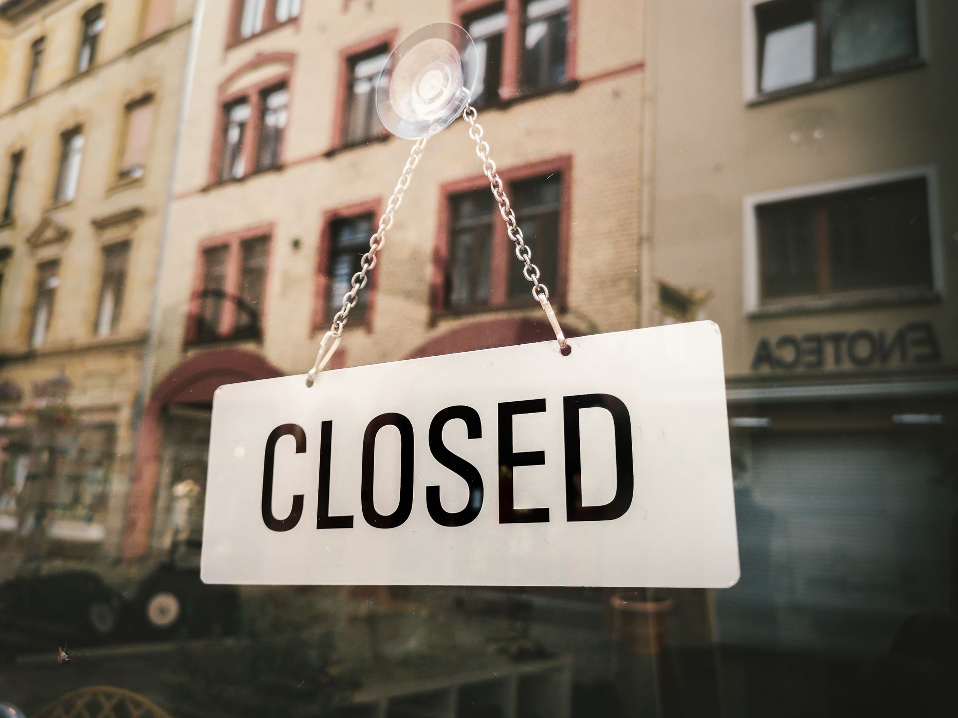a close up of a closed sign